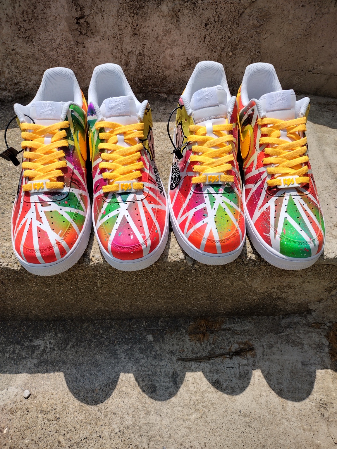 Four hand painted custom sneakers